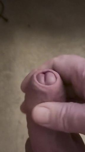 My Friend Sits in a Chair and Jerks off His Cock While Watching Video