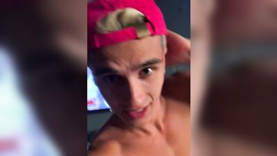 Blonde twink gives a handjob and sucks partner's hard dick