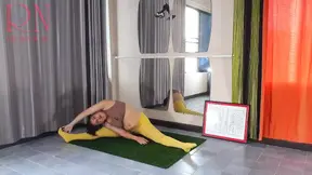 Regina Noir. Yoga in yellow tights doing yoga in the gym. A girl without panties is doing yoga. An athlete trains in a p