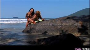 Blonde and Brunette Lesbians Play Intimately on Sunny Beach