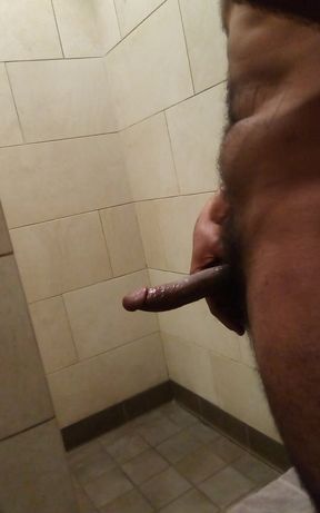 Big black cock handjob in the bathroom