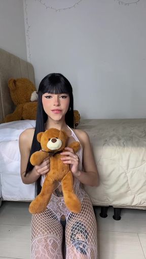 Teddy bear in bed