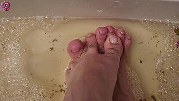 Washing my feet with rose petals and herbs after a HARD day of work