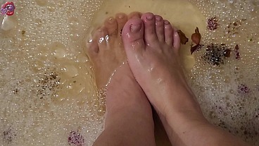 Washing my feet with rose petals and herbs after a HARD day of work