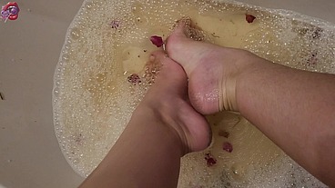 Washing my feet with rose petals and herbs after a HARD day of work