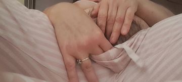 putting his fingers in her wet pussy, leaving his pants wet with a jet of orgasm