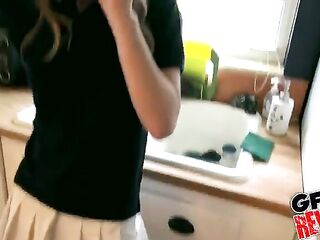 Blue eyed chick is kneeling in front of her golf teacher and giving him a oral-sex