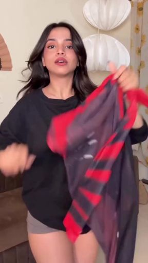 Indian brunette babe teen shows off her ass