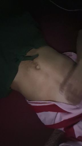 Hot twink masturbates alone in a dark room