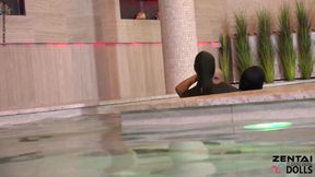 Two Zentai Girls with Slave in Pool