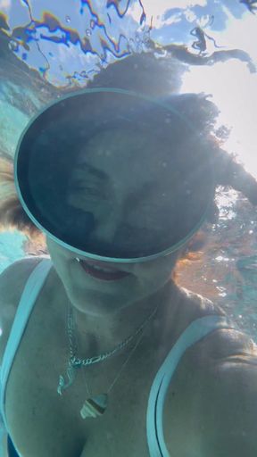 Carissa in a workout swimsuit wearing Cloud shoes in the pool