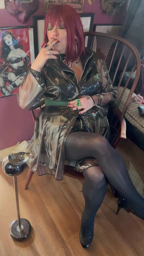 PVC Clad In Her See Through Coat Miss Tina Snua Smokes A Cigarette For You