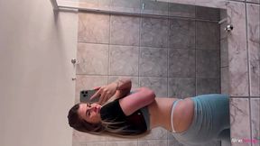 Curvy Latina Aline Novak masturbates her big booty in the gym bathroom