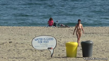 Naked Euro babe disgraced on the beach