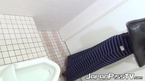 Voyeur video of innocent Asian girls peeing in the public toilet