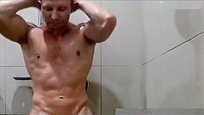 sexy muscle guy takes Hot shower and suds up + wet clothes preview