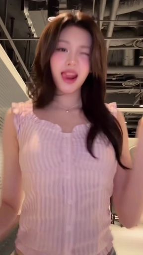 Slim Thai girl poses in K-pop outfit