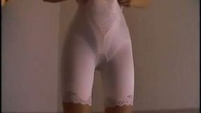 Japanese lady in girdles shows off her sexy legs and her pussy