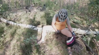 During a long bike trip I need to piss, public forest road is a nice opportunity