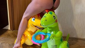 Nastya walks and steps on inflatable dinosaurs, tramples them, stands on their paws and faces, and walks on their bodies. Barefoot + foot fetish + crush fetish and trampling + jump
