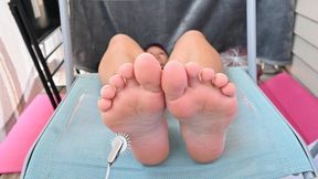 Tickling Dylan’s feet with a metal pinwheel (720)