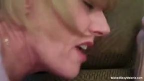Blonde grandma is tugging and sucking cock in POV