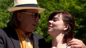 Scarlet Rose does sucks and fucks two huge cocks outdoors
