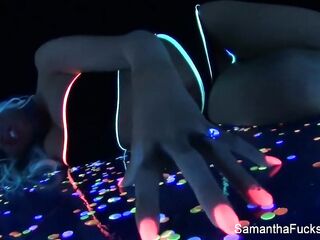 Colorful blacklight teasing with Samantha Saint