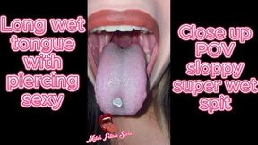 Close up of Mila's hot sexy wet sloppy tongue with sweet heart piercing