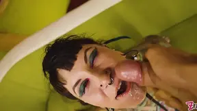 Heavily tattooed babe gets a sloppy suck and facialed