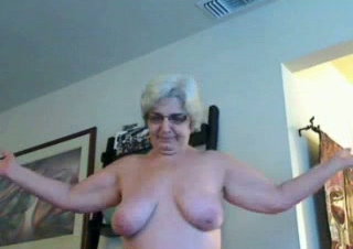 Four eyed granny with saggy breasts shows it all on webcam