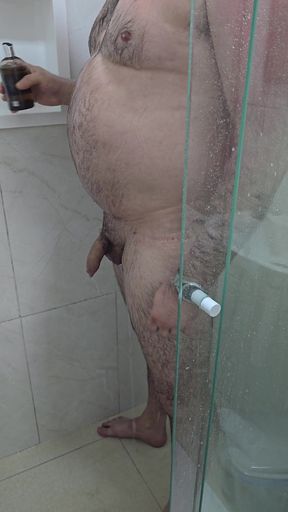 DILF Bear washing his uncut cock in the shower
