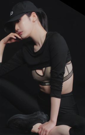 Female K-pop idol in athletic outfit