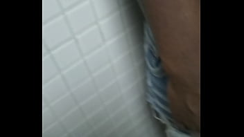 Sucking my friends dick in the bathroom stall