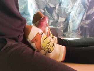 Giving sockjob and that guy cums on my socks