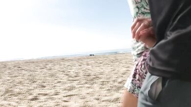 Blonde mom deep throats on the beach with strangers watching