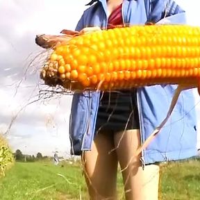 Stunning German lady stuffing a corn in her moist holes