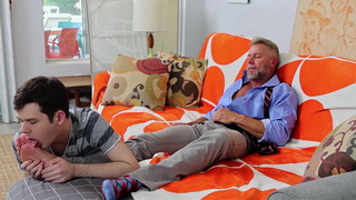 Good boy helps his big stepdaddy relax