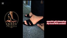 Girl stomping My hand With sandals