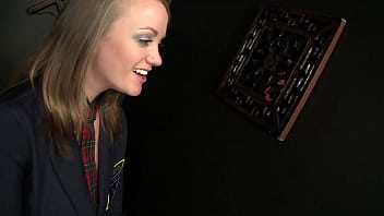 Nasty chick plays with her pussy and sucks a priest at the confession through gloryhole