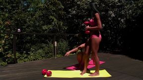 Mia and Tess outside on their exercise mats