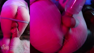 Femboy edges huge cock and fucks fleshlight in pink fishnets