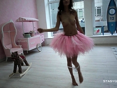 Sveta dancing wearing a pink ballerina tutu dress