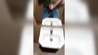 heterosexual dude in blue denim drains off in public wc