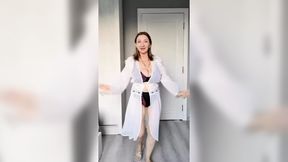 Busty MILF strips and shows off big natural tits