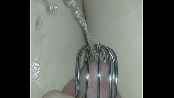 sissy pissing herself again with a new chastity