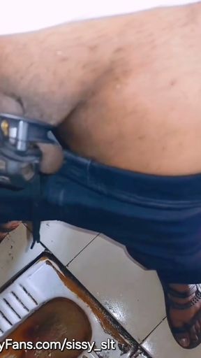Ladyboy play with her limp little penis and piss   Clip 1