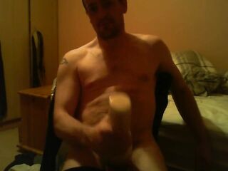 Sitting on chair watching porn fucking a felsh light till I ejaculate