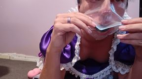 Maid Marcy plays with her cage