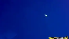 Blond model taking sunbaths and getting pleased by two guys